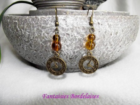 Boucles d'oreilles horloges bronze et topaze 